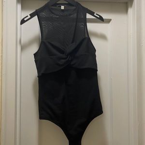 A beautiful body contour top. A most have in your closet.